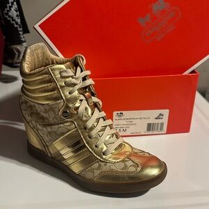 Coach Women's Metallic Gold Wedge Sneakers
